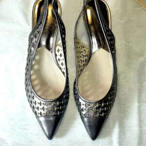 Michael Kors size 9. Silver studded sling backs 2” heels